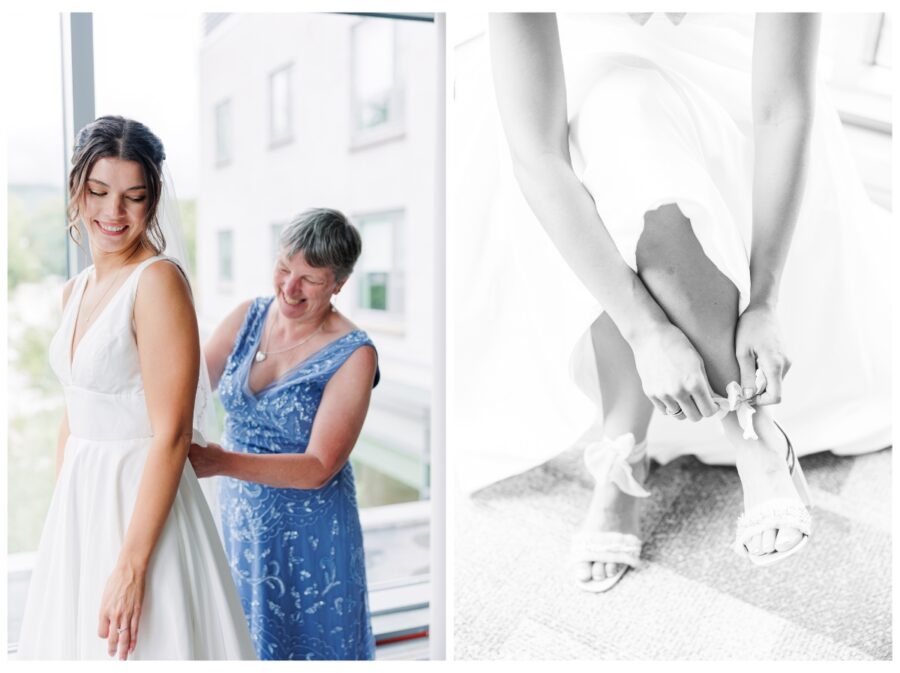 Bride getting into wedding dress with mom's help