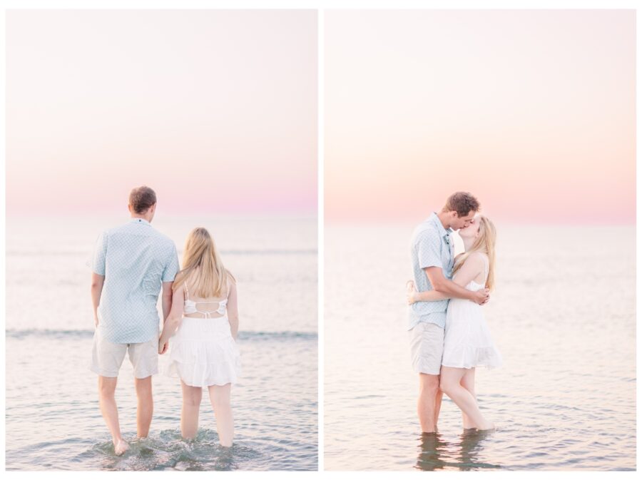 Couple holding hands and walking in the ocean at Wingaersheek Beach Engagement session in Gloucester, MA