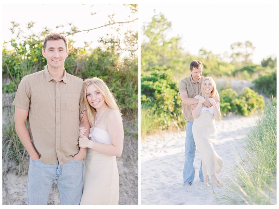 Couple hugging in sand by beach grass at Wingaersheek Beach Engagement session in Gloucester, MA