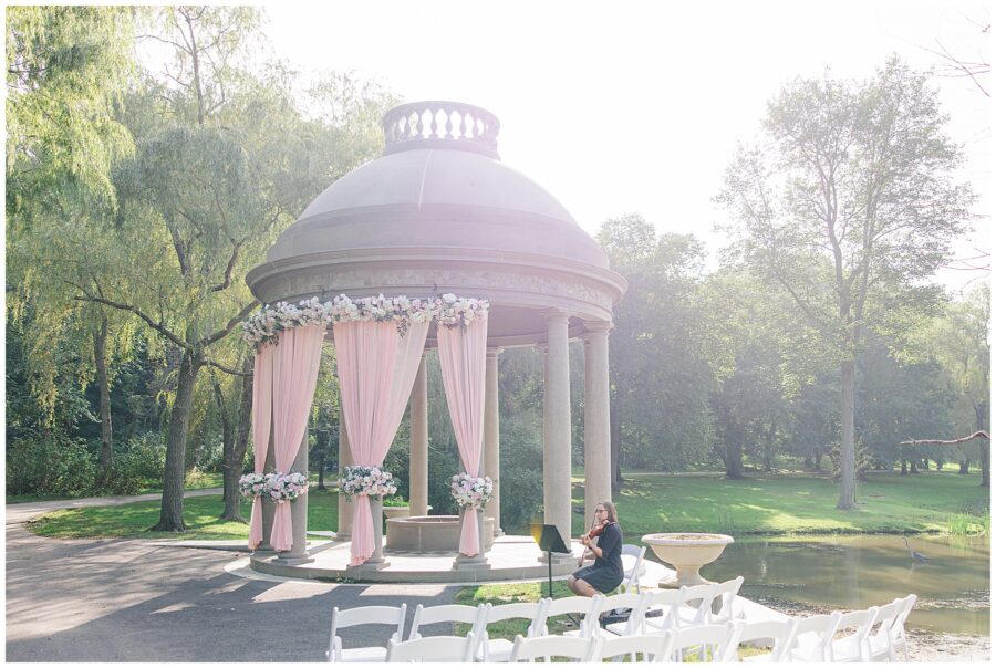 Larz Anderson Park tempietto decorated with florals and blush linens for wedding