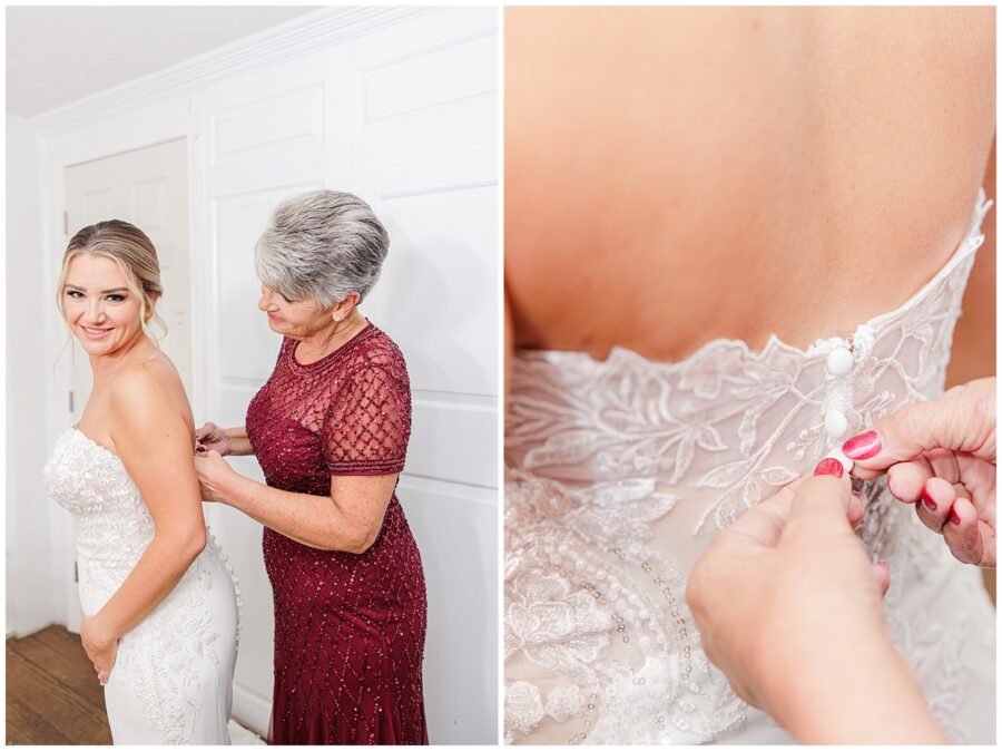 Mother of the bride buttoning the bride into her wedding dress