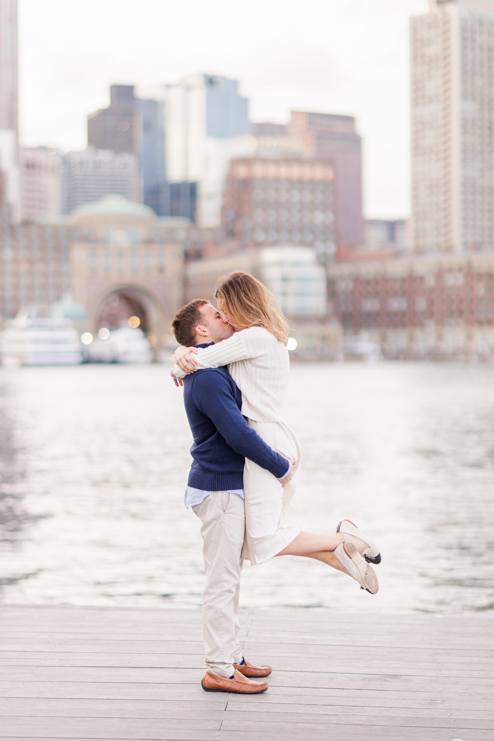 Couple kissing during Boston Seaport engagement session