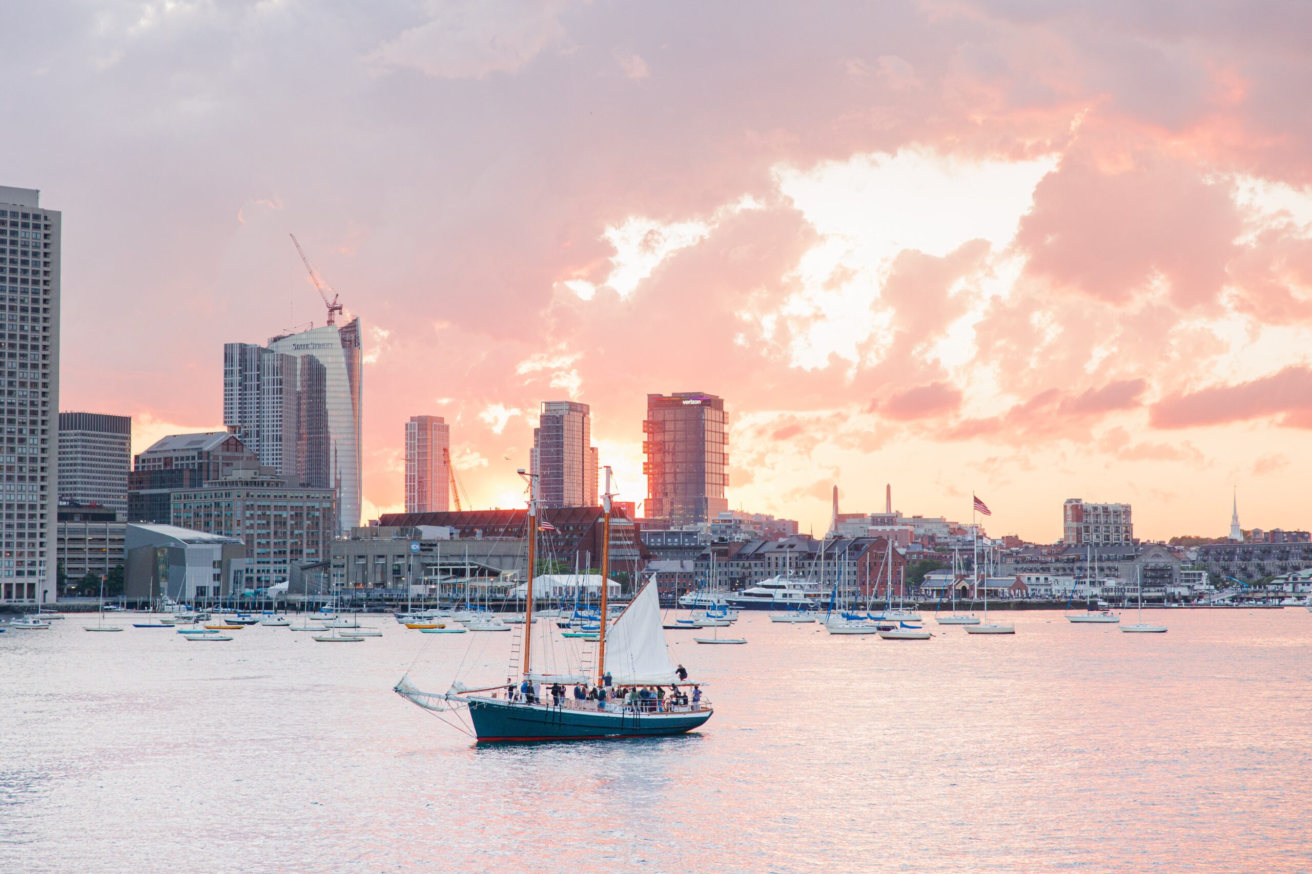 Boston Harbor at sunset representing the best Boston engagement photographer