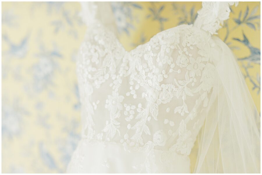 Close up of lace details on the bust of a wedding dress representing New Hampshire wedding photography