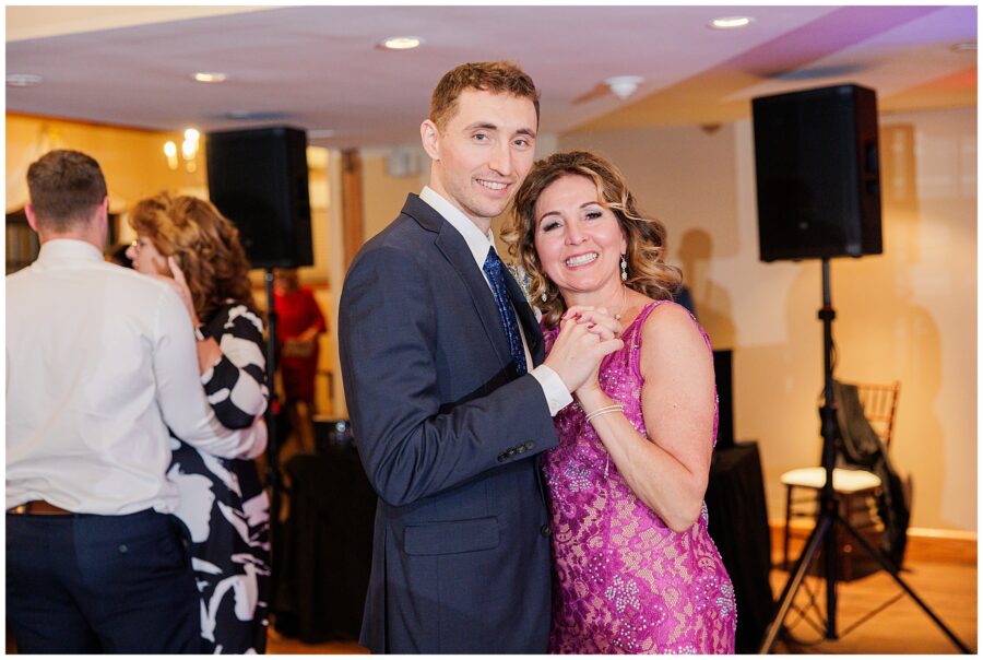 Groom dancing with his mother during his New Hampshire wedding 