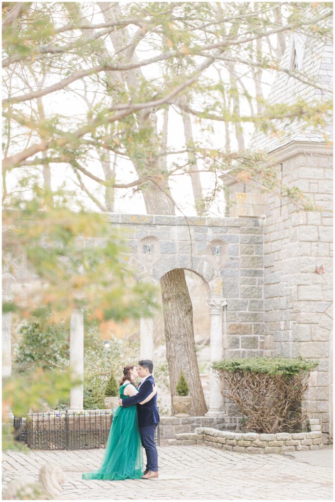 Couple kissing at Hammond Castle