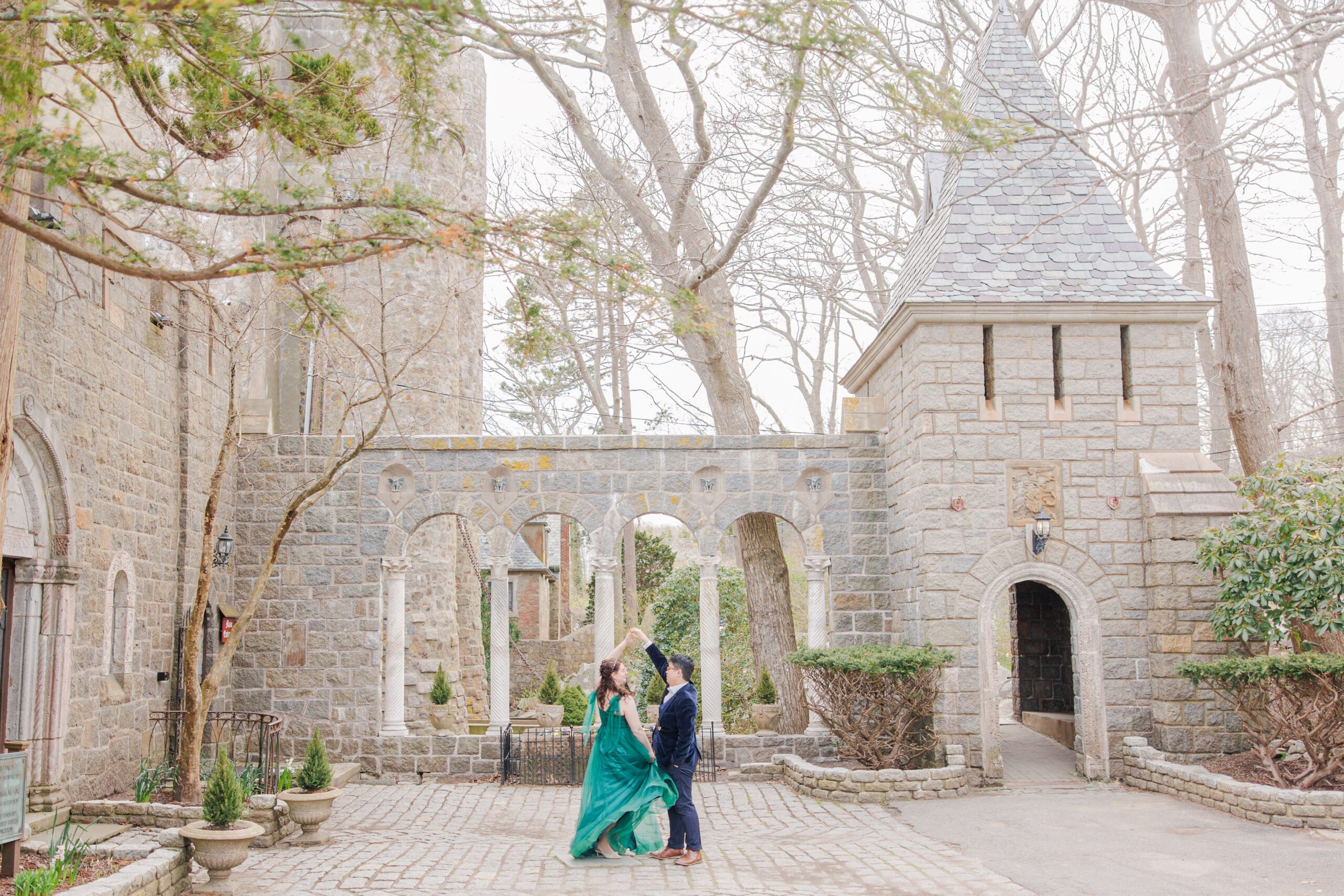 Couple dancing in the courtyard at Hammond Castle