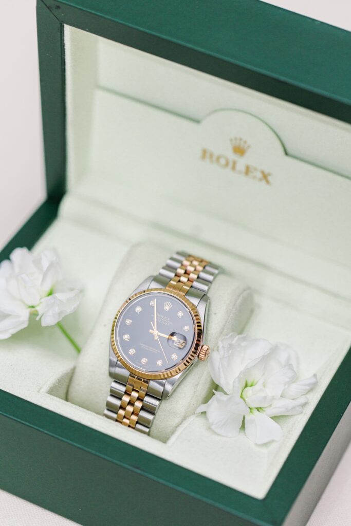 Rolex watch inside of its protective case representing Cape Cod wedding photography