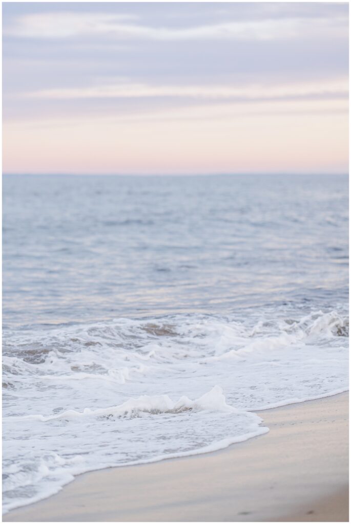 Close-up of the ocean waves gently hitting the shore at a private beach in Newburyport, MA, taken during a senior photo session.