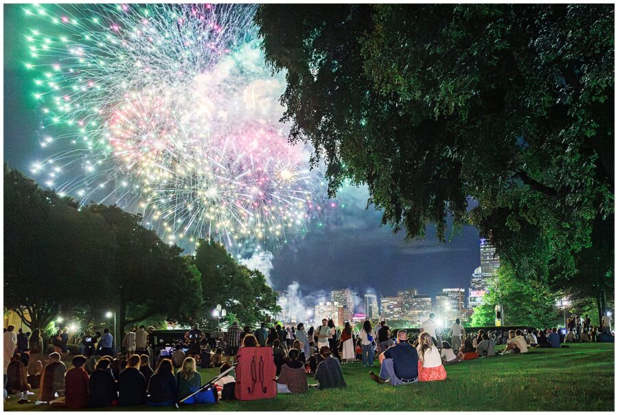 Spectators enjoy colorful fireworks during Boston’s 4th of July celebration, a festive setting for marriage proposal ideas Boston.