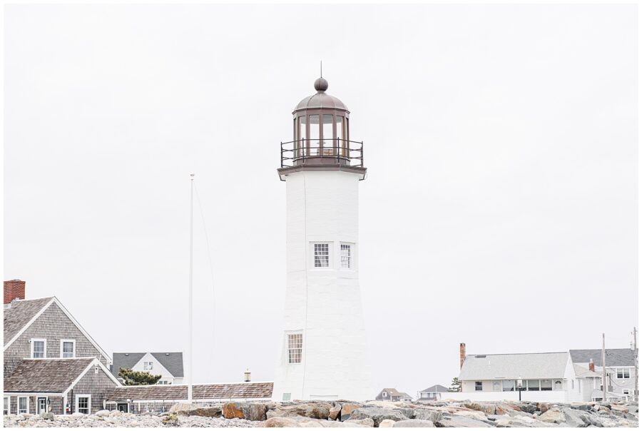 Wide scenic view of Scituate Lighthouse proposal location with lighthouse and coastal homes in Scituate MA