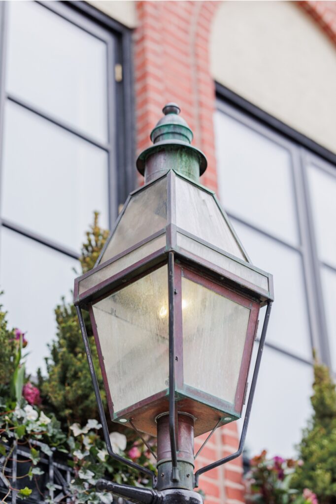     Historic lantern and brick architecture in Beacon Hill photographed during a Boston engagement session