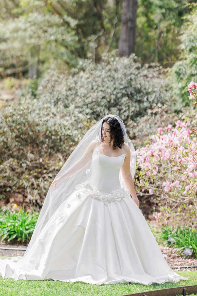 Full-length bridal portrait in the gardens at Heritage Museums & Gardens wedding venue in Sandwich MA