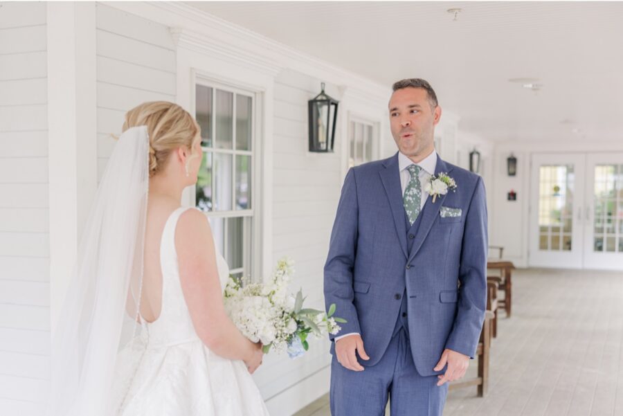 Groom reacting to seeing his bride during their Publick House wedding first look.