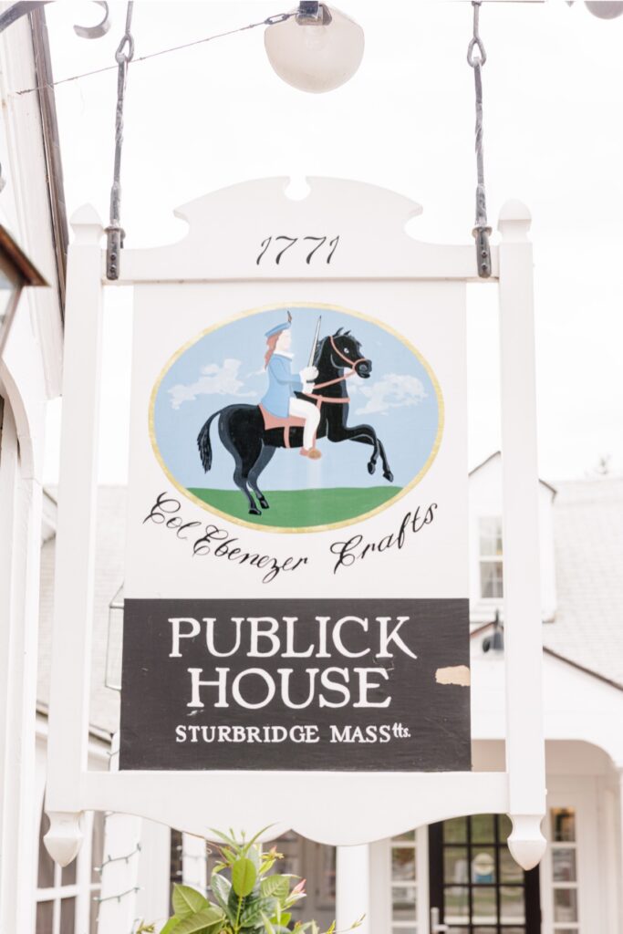 Historic Publick House sign displaying the inn’s 1771 founding date in Sturbridge, Massachusetts.