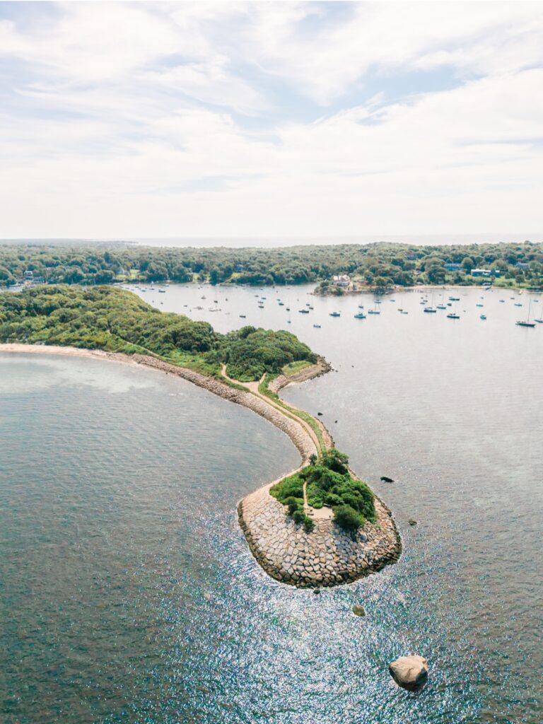 Aerial view of The Knob in Falmouth with coastline, harbor, and sailboats.
