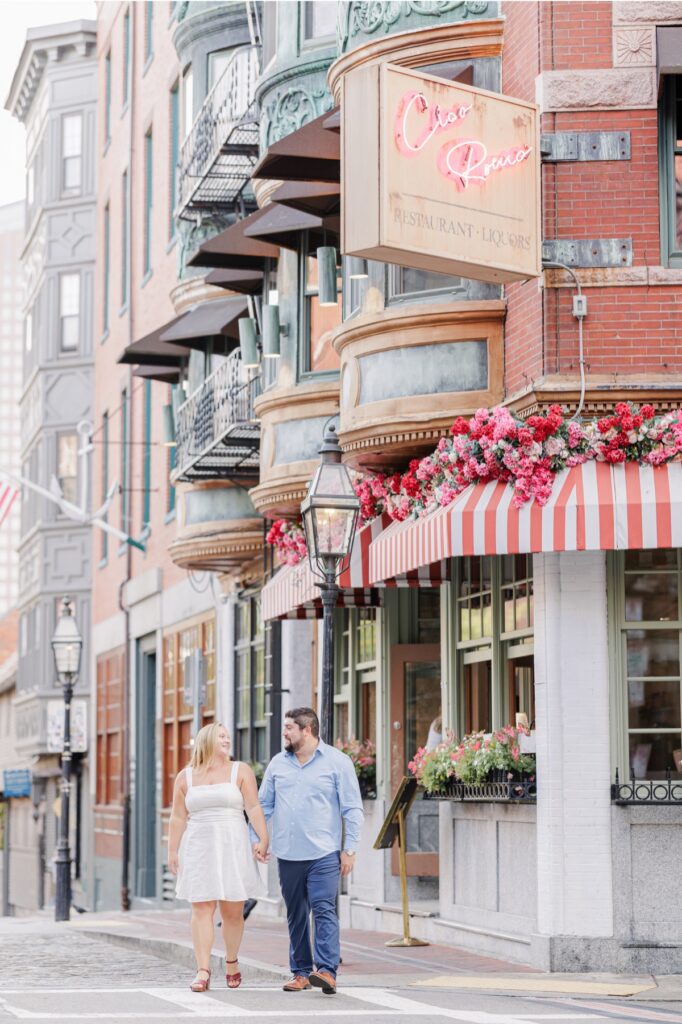 The light-up Ciao Roma sign and historic restaurant exterior in Boston’s North End